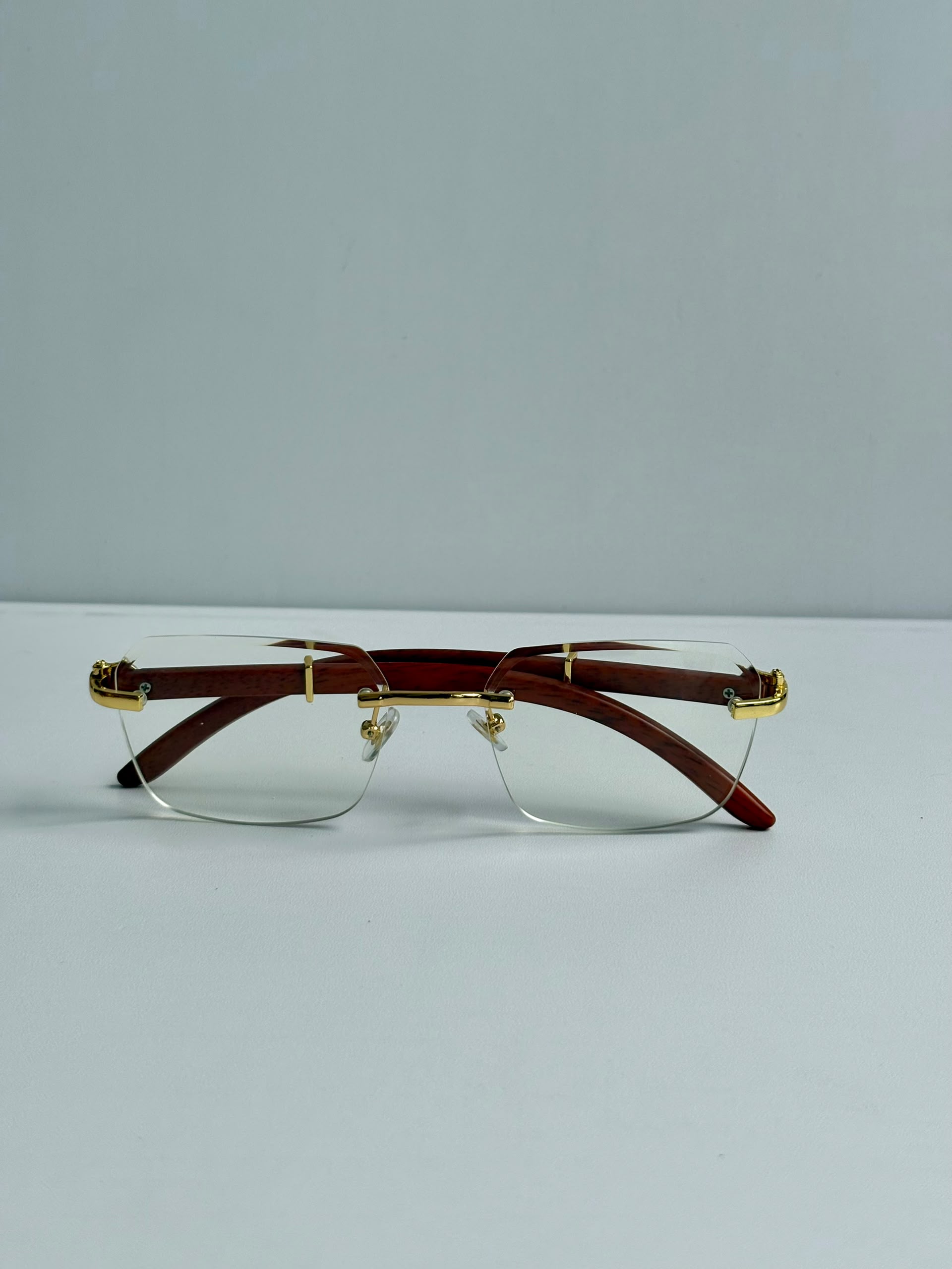 Stylish man wearing Luxe Vision premium eyewear